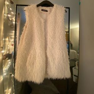 Sleeveless solid fur vest